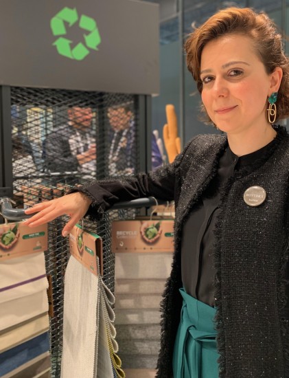 Boyteks Marketing Manager Ilknur Dag stands by the recycled collection during Evteks. 