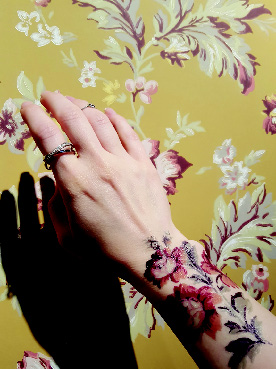 The Swedish wallpaper art of Sandberg was cleverly promoted through temporary tattoos offered to visitors of the showroom.