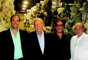 Salomon Ojalvo and dad Jose with brother Jack and Danny Delgado, export manager in the new warehouse